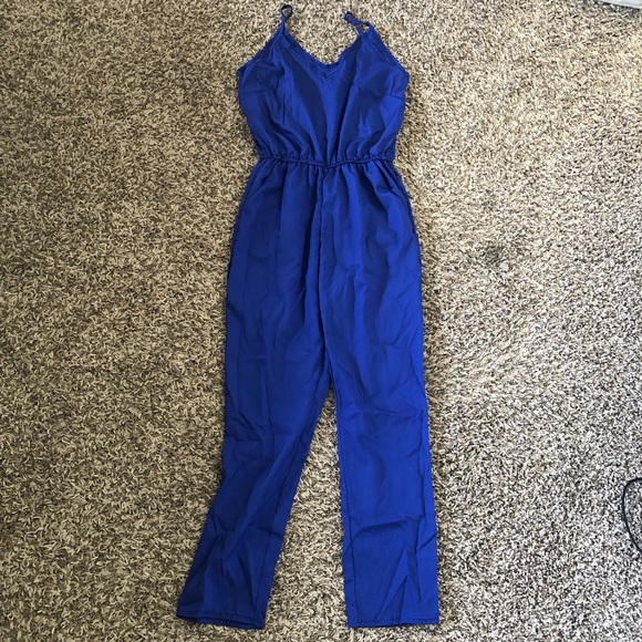 Match and Wear Pants - Size small bright blue jumpsuit with pockets